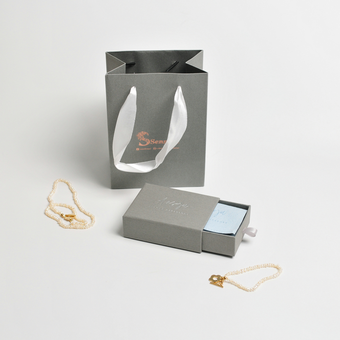 Hoe ontwerp je de minimalistische sieradenverpakking?